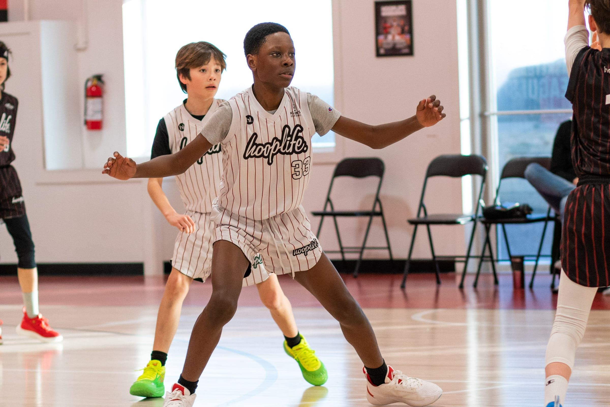 Two players going one on one in a small-sided game at HoopLife in Regina