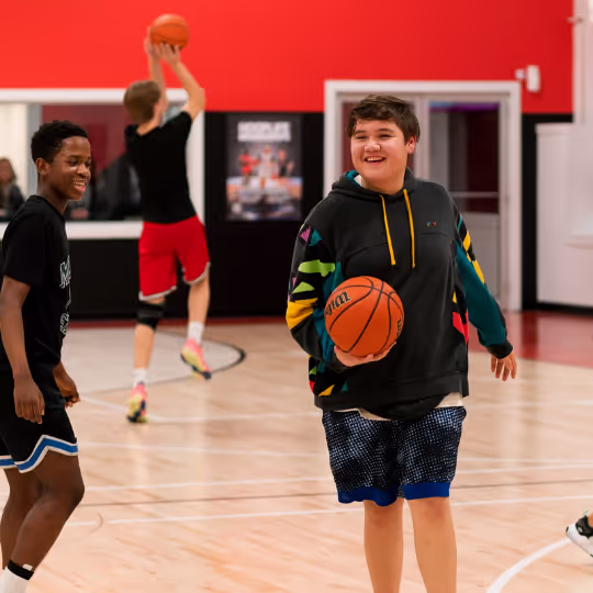 Athletes smiling and laughing at each other