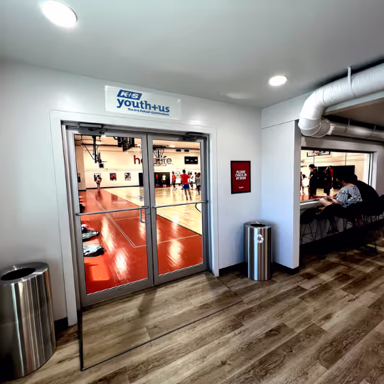 The doors from the HoopLife lobby onto the court