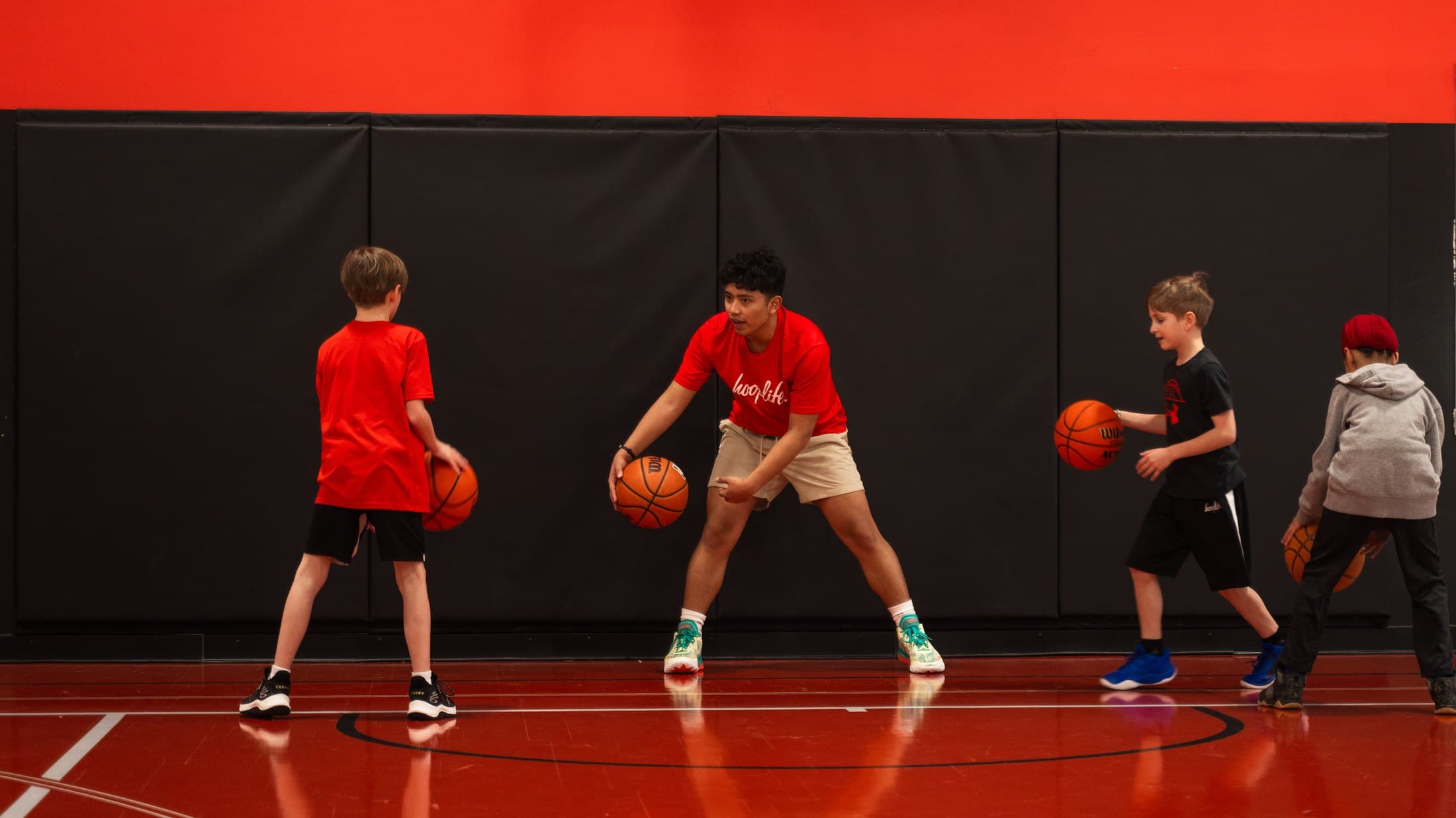 Players training on the HoopLife court in Regina
