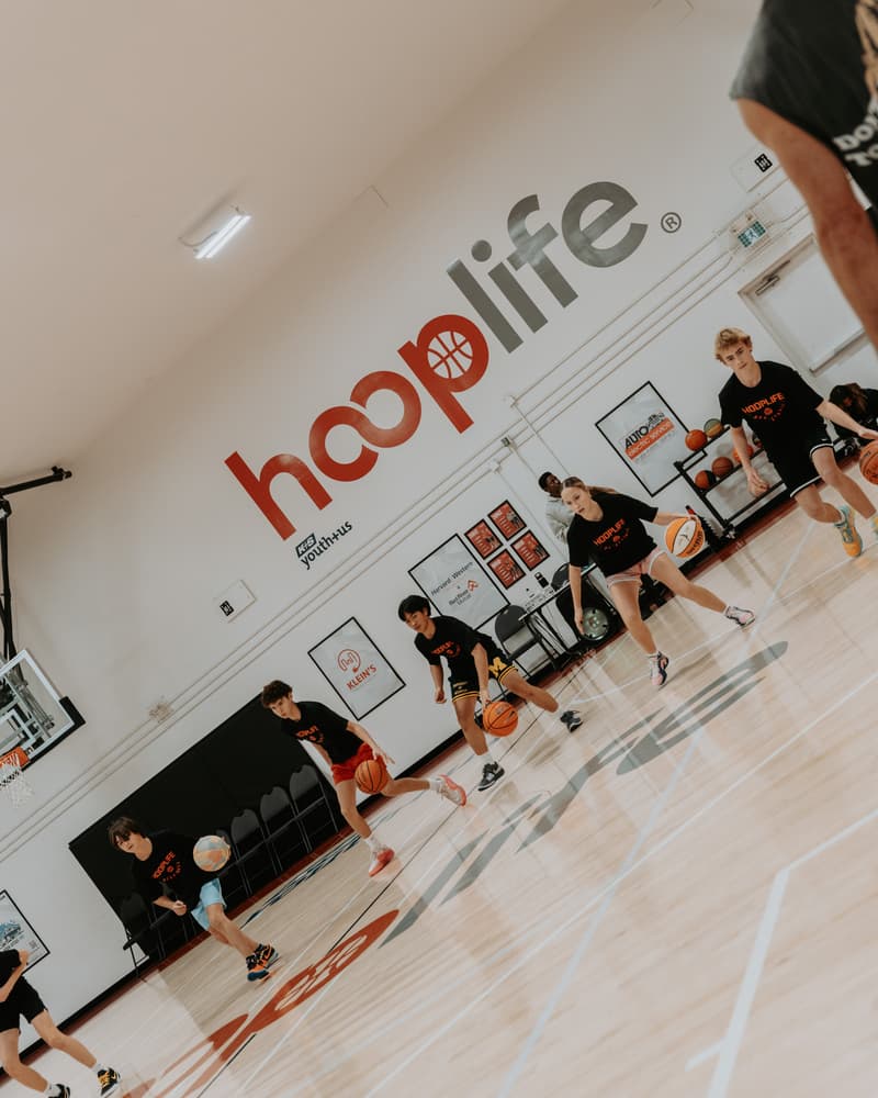 The HoopLife court in use under the hooplife wall