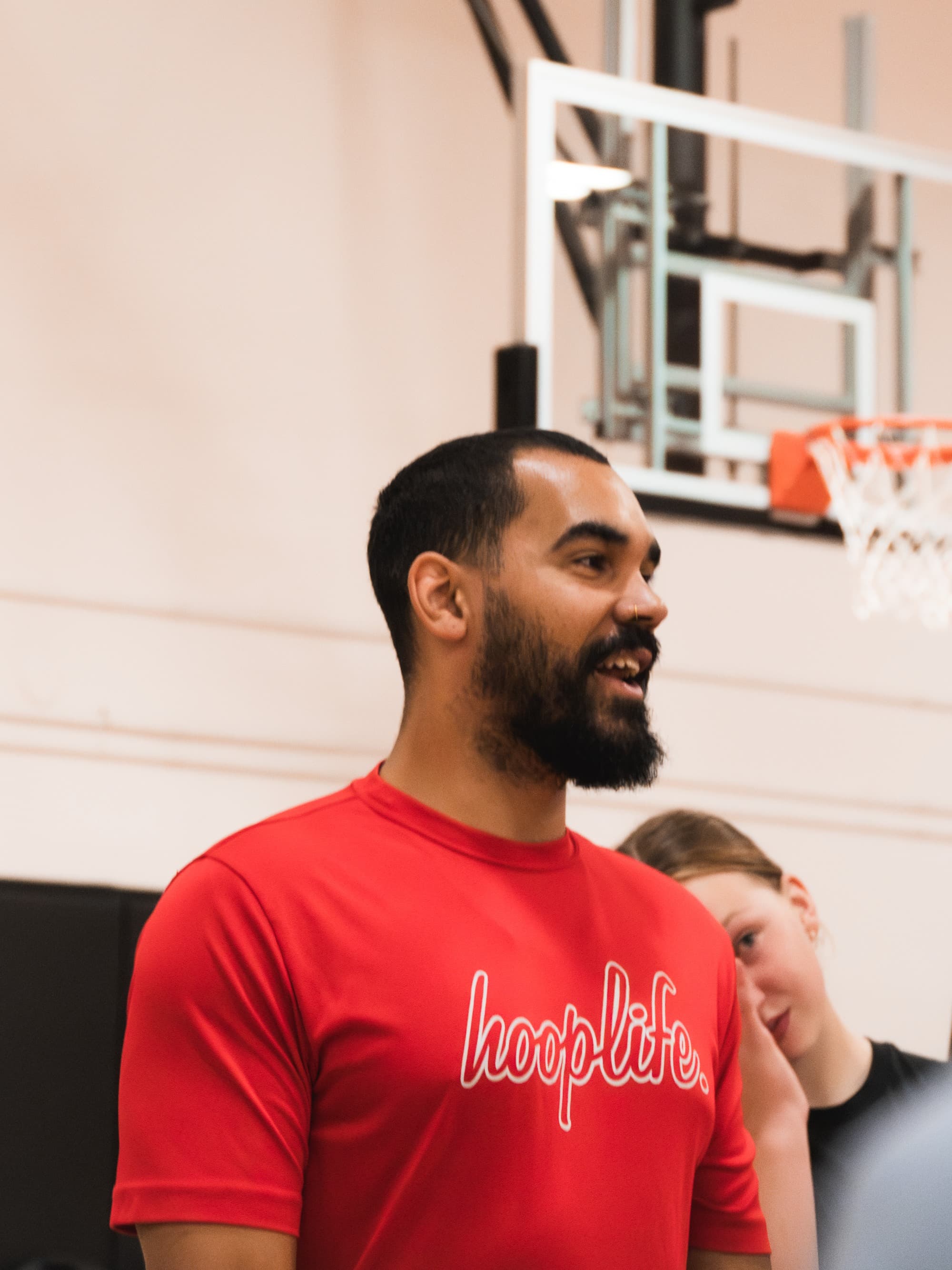 Keegan Edwards coaching on the court at the HoopLife Centre in Regina