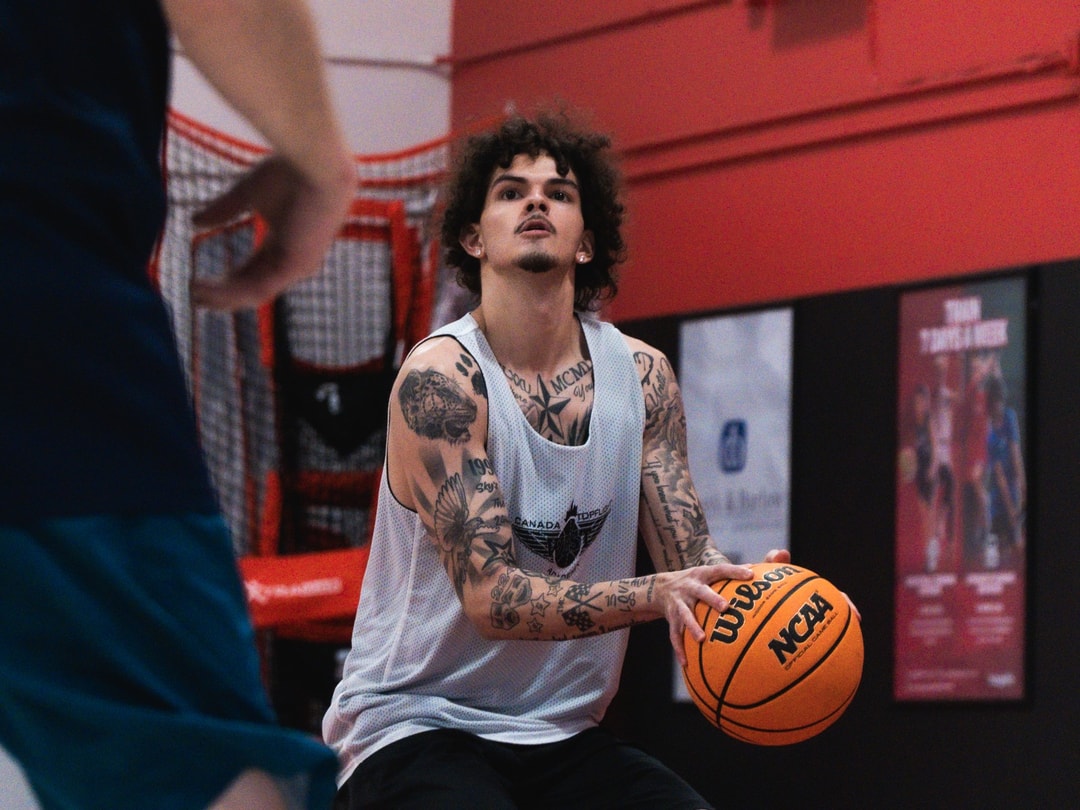 An adult league player working a crossover in Regina