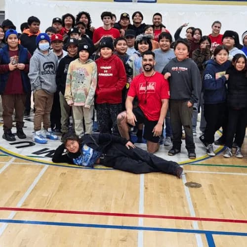 A school group with their HoopLife coach after a clinic