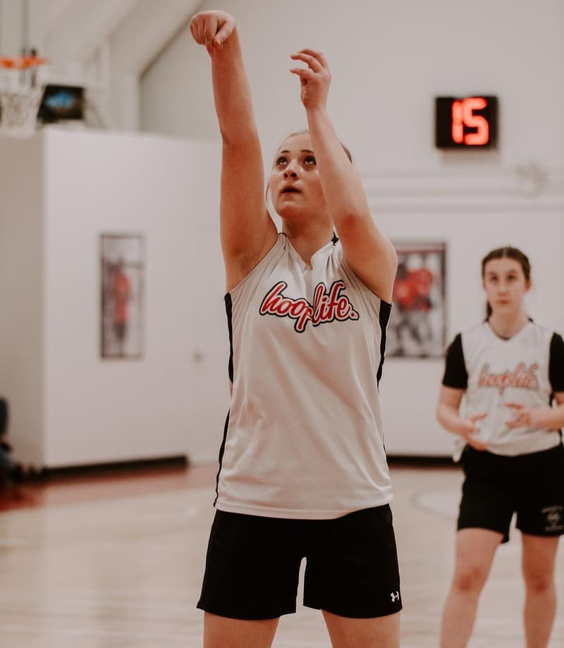 A HoopLife player following through on her shot