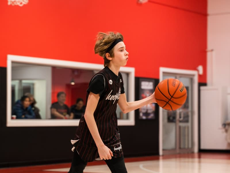 A girls division HoopLife League player on the attack