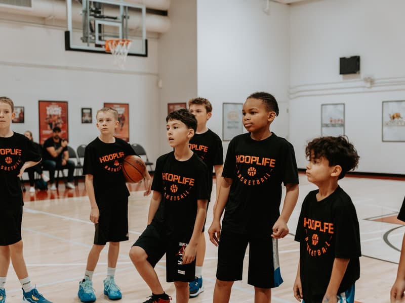 A HoopLife Basketball Training session group mid-drill in Regina