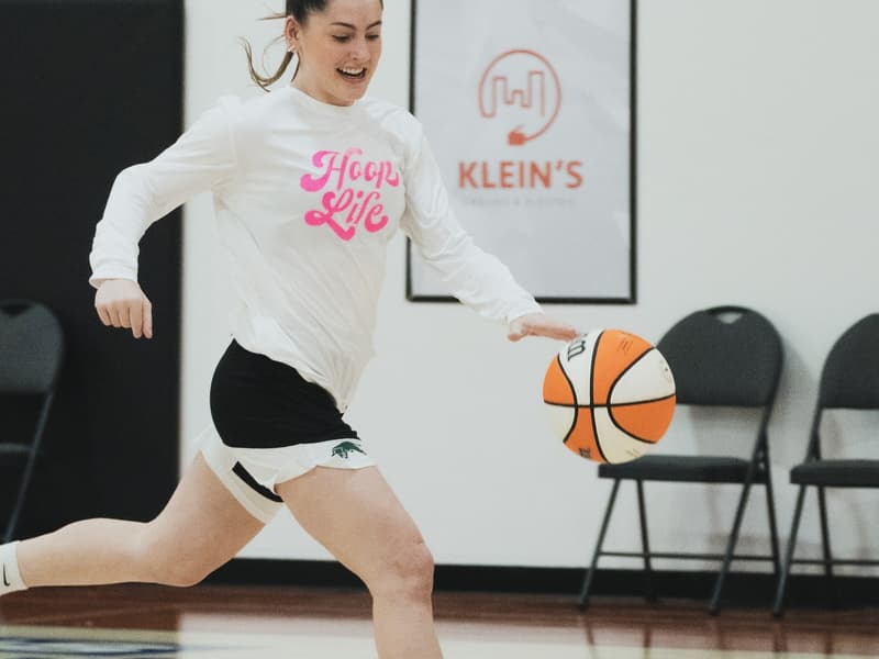 A member pushing the ball on the move