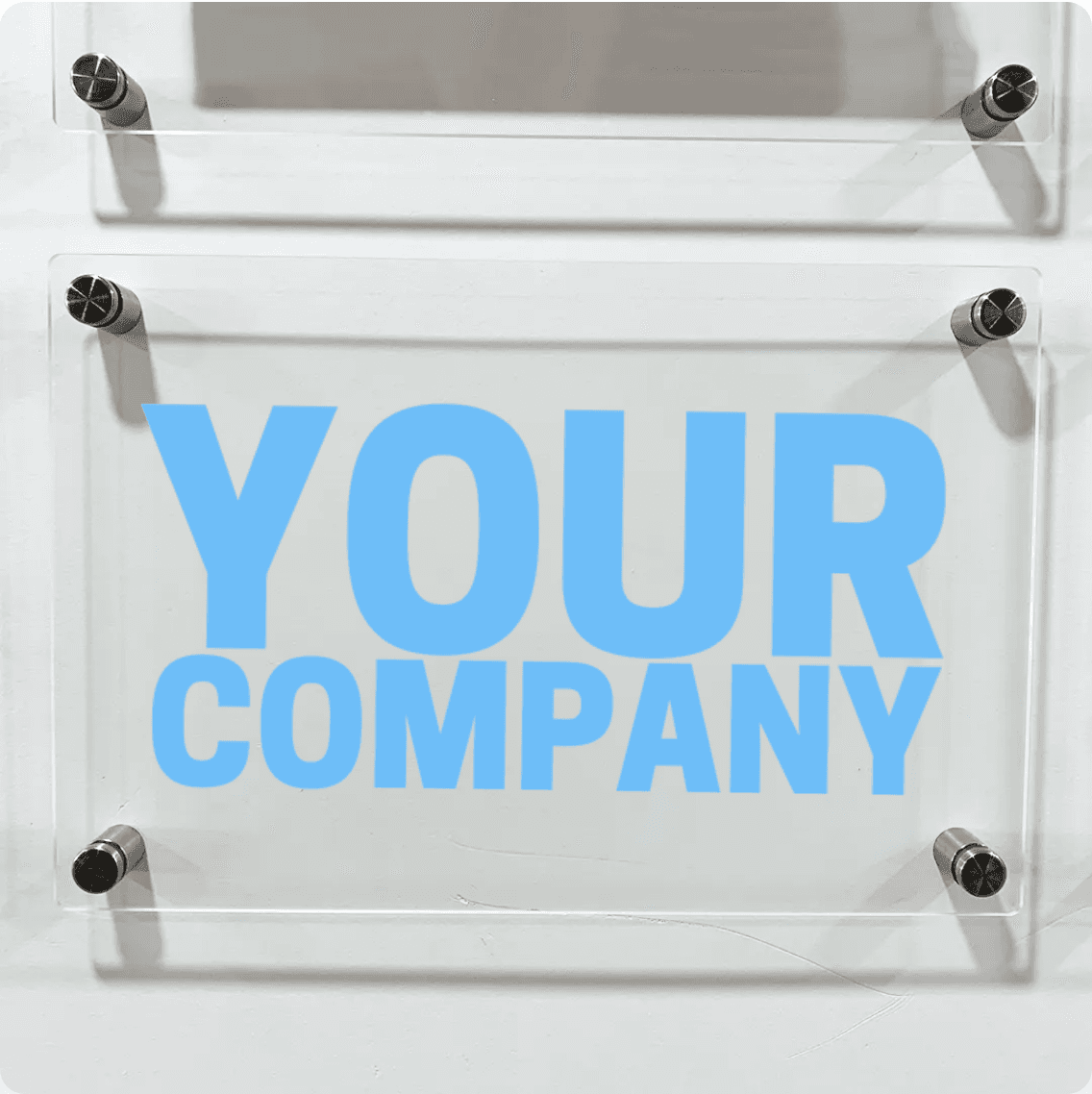 A company logo on a premium acrylic sign mounted in the HoopLife lobby