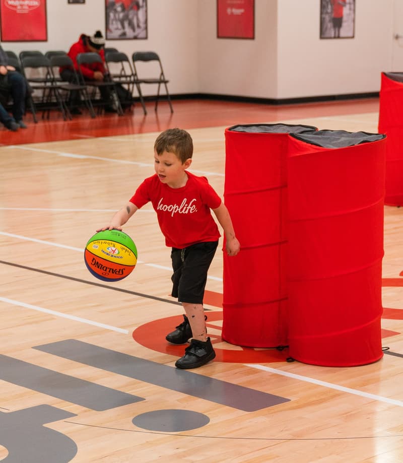 A Young Star dribbling on the move at the HoopLife Centre