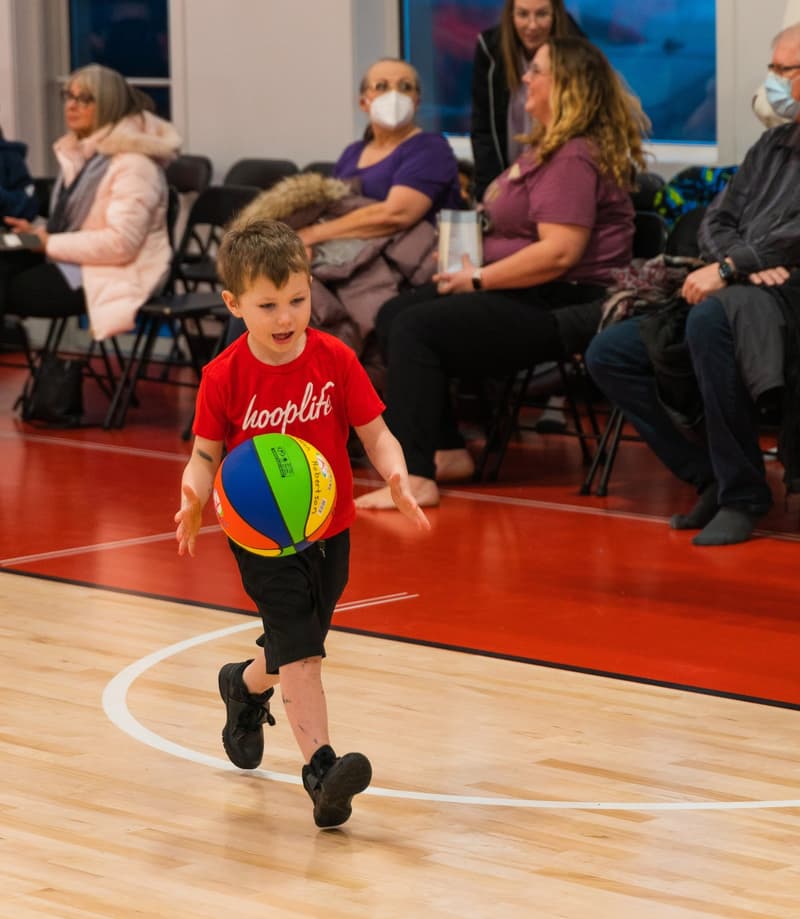 One of our youngest players dribbling down the HoopLife court