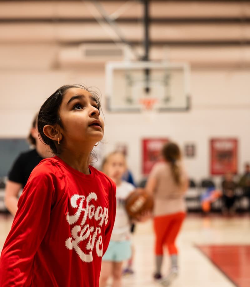 A Young Star watching her shot at the HoopLife Centre
